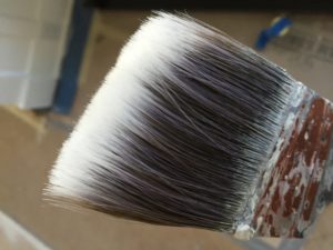 Closeup of a used Purdy paintbrush 